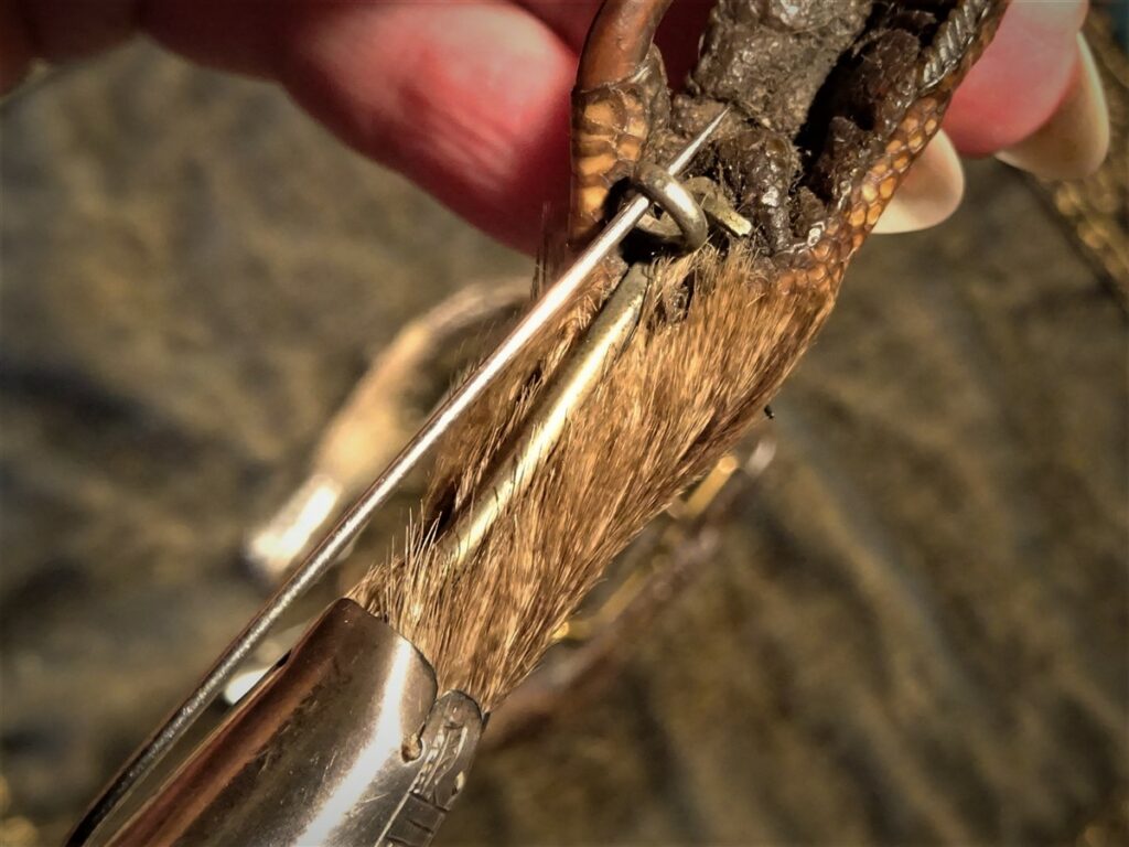 A Victorian pin with a C clasp made by simply curling the wire