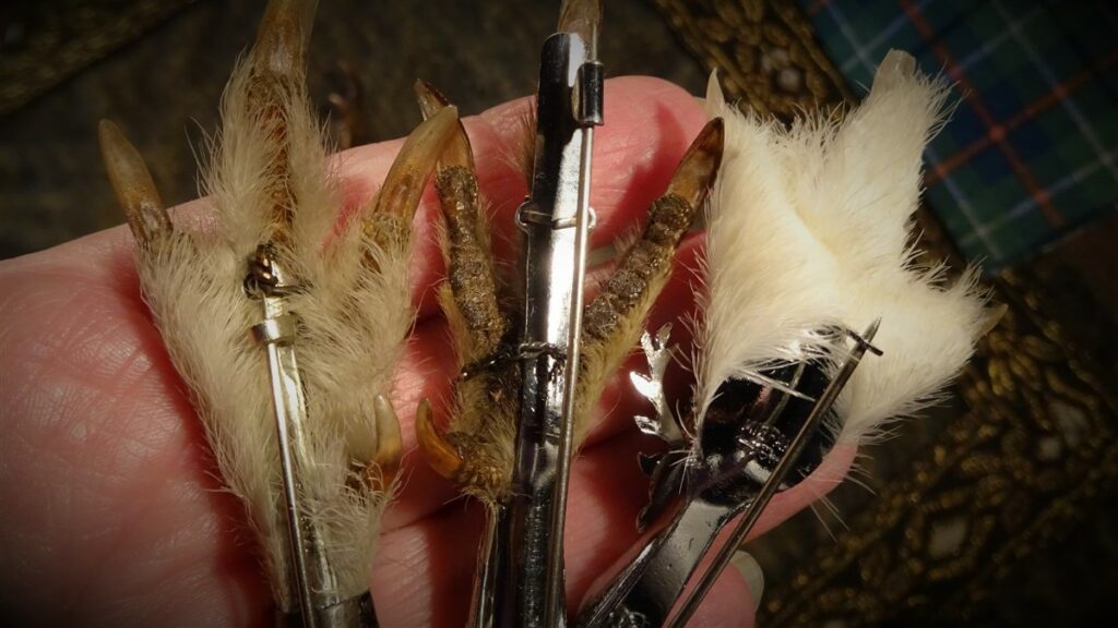 Three newer pins with new style C clasps